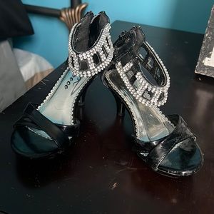 Adorable black heels with stone appliqué. Some stones missing.